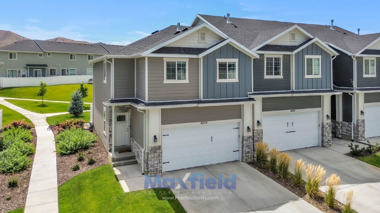 Spacious 5-Bedroom End-Unit Townhome with Finished Basement & Community Amenities Galore property image